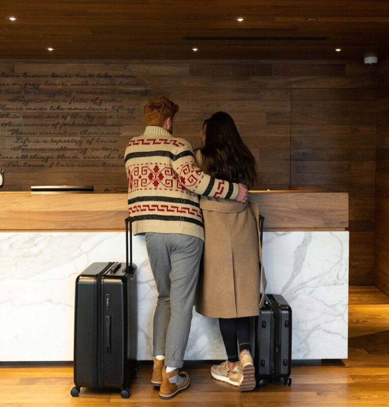 Couple checking in a hotel